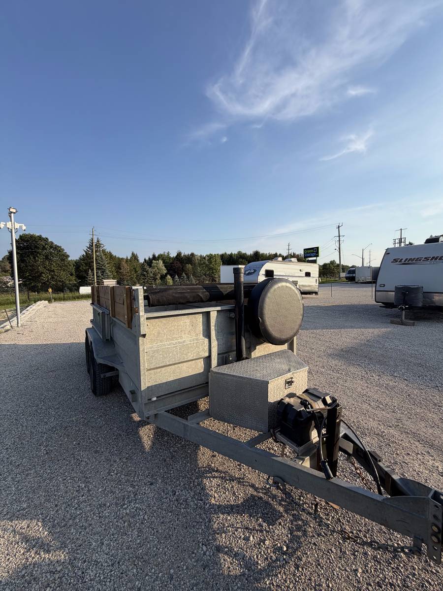 Dump trailer front toolbox and spare tire